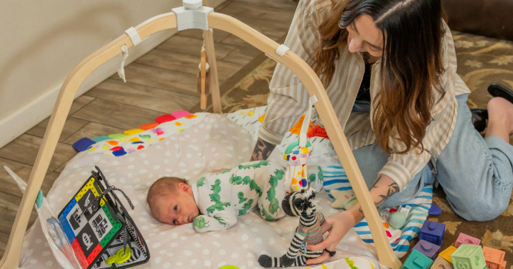 Parent shows love to newborn through interaction